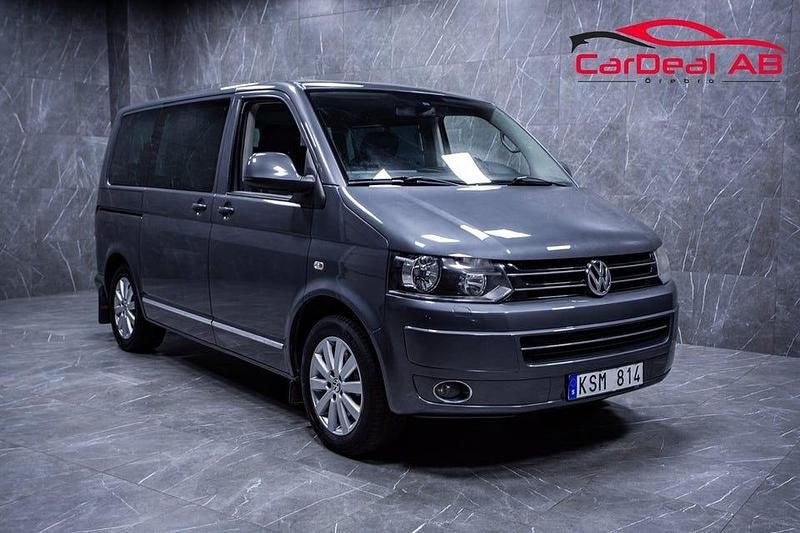 Grå Begagnad 2011 VW Multivan Highline Van | 189 800 kr (Marknadspris) - Bild 1/4