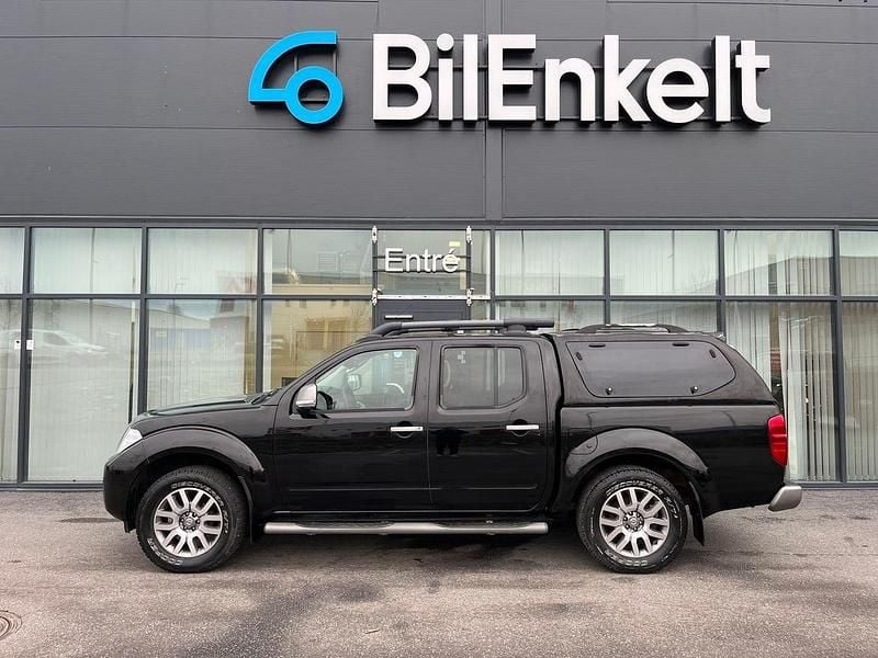 Svart Begagnad 2013 Nissan Navara Pickup | 149 900 kr (Marknadspris) - Bild 1/4