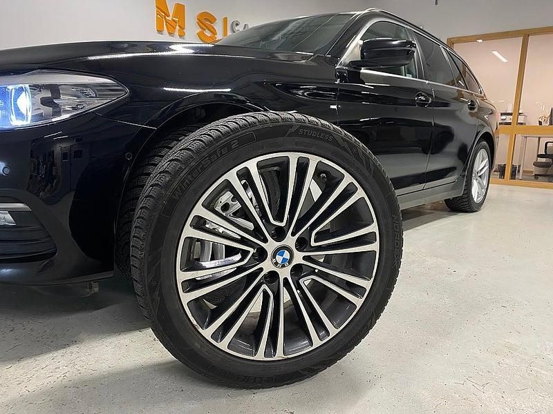 Begagnad BMW 520 190 HK (139 kW) 2017 Svart Kombi