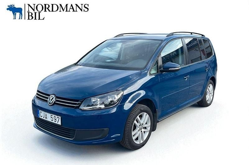 Blå Begagnad 2013 VW Touran Minibuss | 79 900 kr (Bra pris) - Bild 1/4