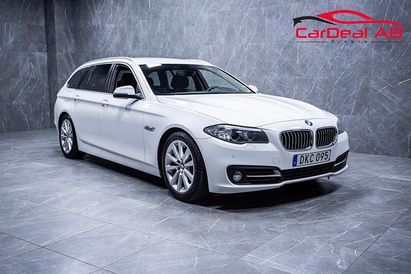 Vit Begagnad 2014 BMW 520 M Sport Kombi | 114 800 kr (Marknadspris) - Bild 1/4