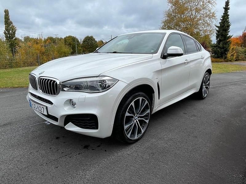 Vit (white pearl metallic) Begagnad 2018 BMW X6 M Sport SUV | 395 000 kr (Bra pris) - Bild 1/4