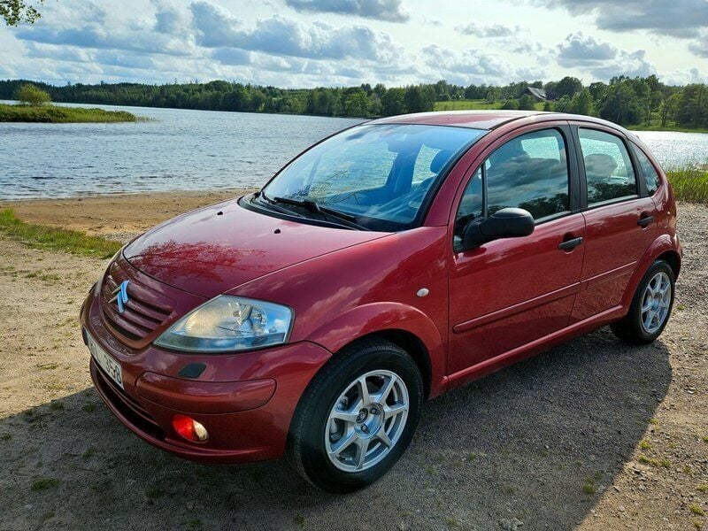 Ljusröd Begagnad 2004 Citroën C3 Halvkombi | 22 900 kr (Marknadspris) - Bild 1/4
