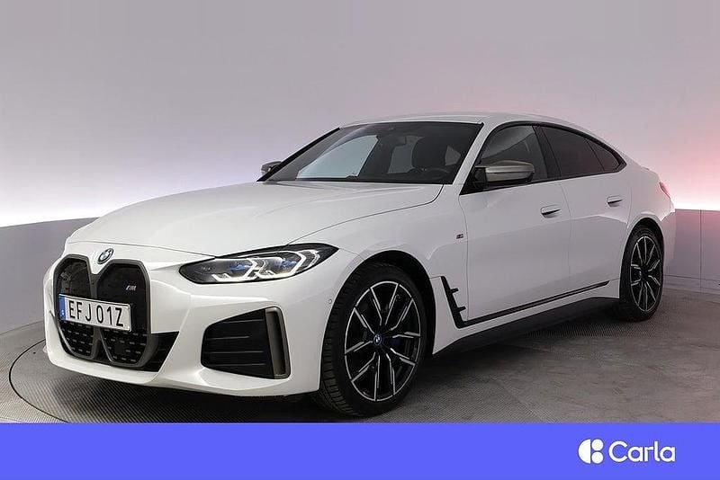 Vit Begagnad 2023 BMW i4 M Sport Sedan | 551 900 kr (Bra pris) - Bild 1/4