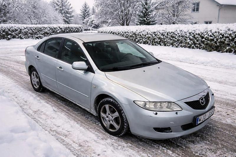 Grå silver control metallic 25h Begagnad 2005 Mazda 6 Inclusive Halvkombi | 24 000 kr (Marknadspris) - Bild 1/4