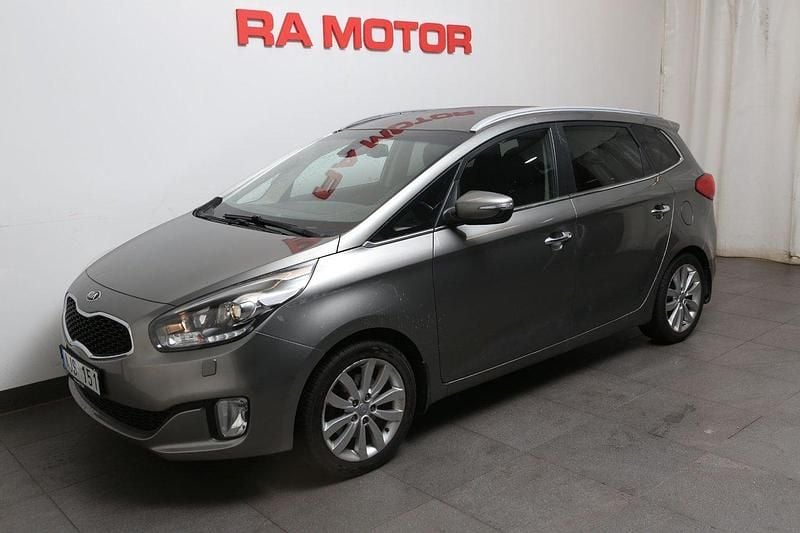 Grå Begagnad 2013 Kia Carens Comfort Minibuss | 129 900 kr (Marknadspris) - Bild 1/3