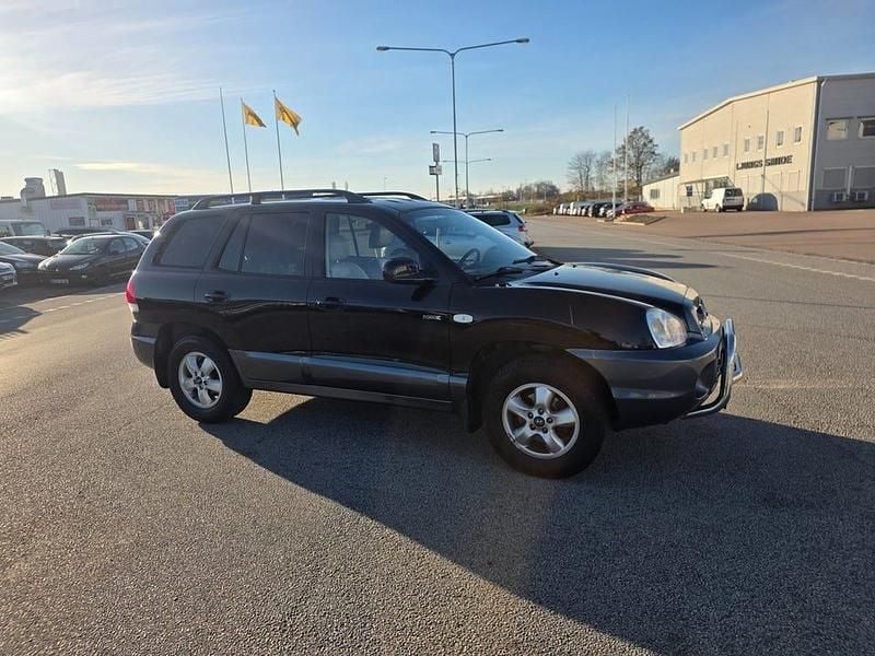Flerfärgad Begagnad 2005 Hyundai Santa Fe SUV | 43 900 kr (Marknadspris) - Bild 1/4