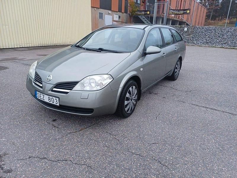 Mörkgrå (grå) Begagnad 2007 Nissan Primera Kombi | 19 000 kr (Marknadspris) - Bild 1/4
