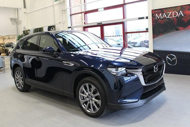 Blå Begagnad 2024 Mazda CX-60 Exclusive-Line SUV | 499 900 kr (Marknadspris) - Bild 1/4