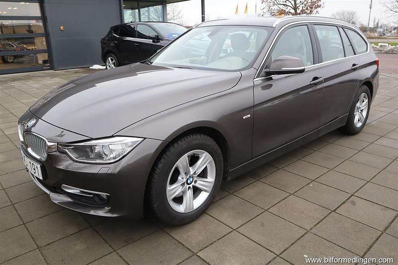 Brun Begagnad 2013 BMW 320 Kombi | 144 900 kr (Marknadspris) - Bild 1/4