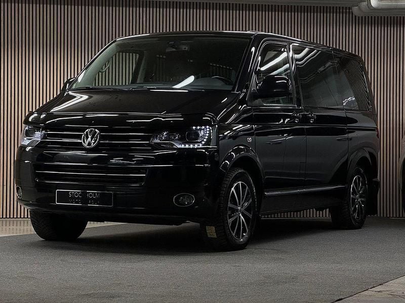 Svart Begagnad 2013 VW Multivan Highline Van | 248 000 kr - Bild 1/4