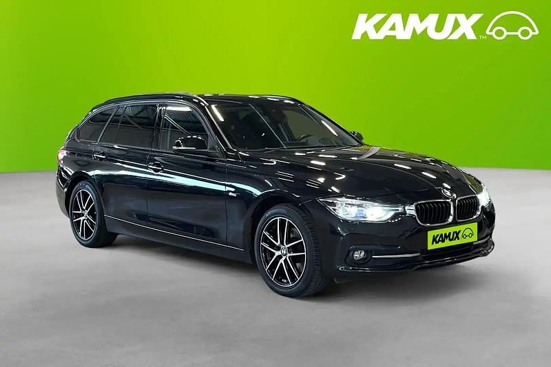 Svart Begagnad 2015 BMW 320 Sport Line Kombi | 189 800 kr (Bra pris) - Bild 1/4