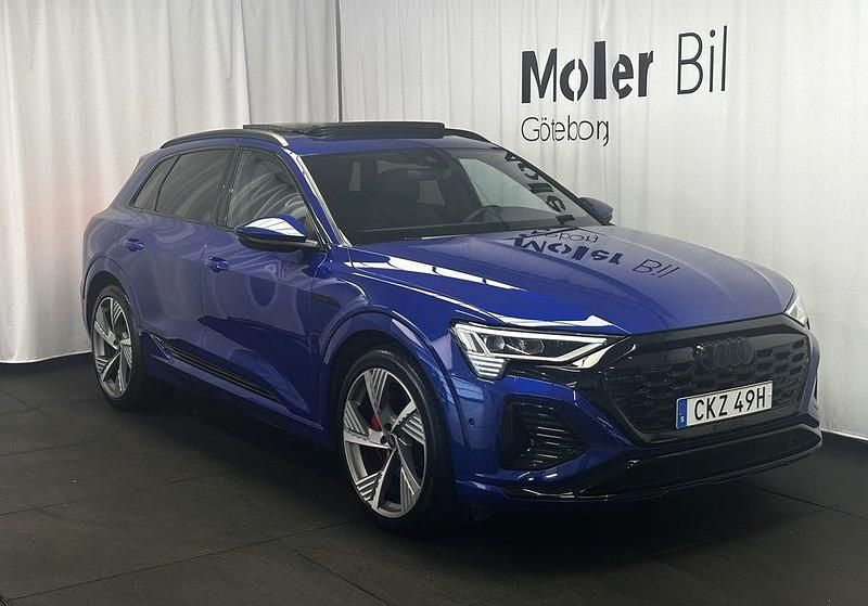 Ultrablå metallic Begagnad 2023 Audi Q8 e-tron S-Line SUV | 659 000 kr (Superpris) - Bild 1/4