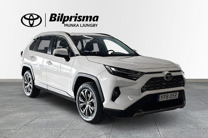 Vit Begagnad 2022 Toyota RAV4 Hybrid Executive SUV | 409 900 kr (Marknadspris) - Bild 1/4