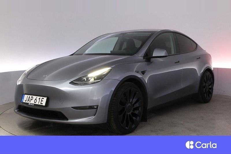 Grå Begagnad 2023 Tesla Model Y Performance SUV | 483 900 kr (Marknadspris) - Bild 1/4