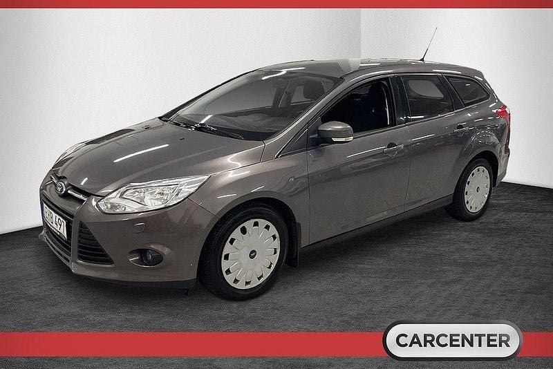 Mörkgrå (grå) Begagnad 2014 Ford Focus Trend Kombi | 64 500 kr (Marknadspris) - Bild 1/4