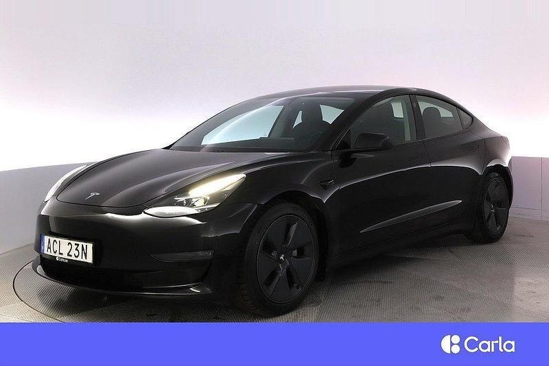 Svart Begagnad 2021 Tesla Model 3 Long Range Sedan | 299 900 kr (Marknadspris) - Bild 1/4