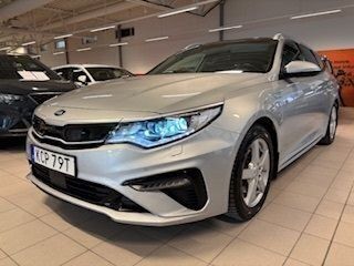 Grå Begagnad 2020 Kia Optima Hybrid Sport Sedan | 219 000 kr (Marknadspris) - Bild 1/4