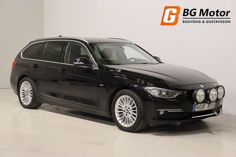 Svart Begagnad 2013 BMW 320 Luxury Line Kombi | 128 900 kr (Lite dyr) - Bild 1/3