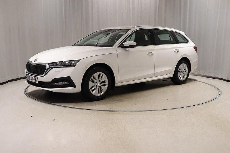 Vit Begagnad 2023 Skoda Octavia G-TEC Kombi | 265 900 kr (Marknadspris) - Bild 1/4