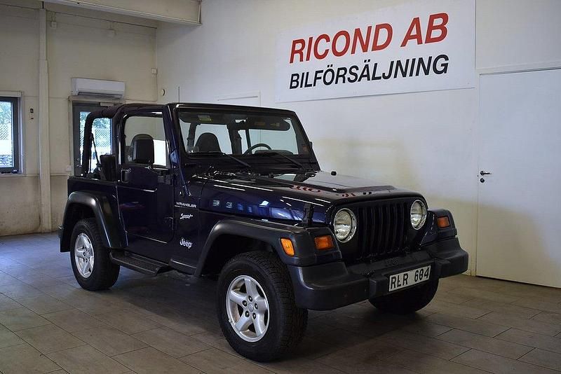 Mörkblå Begagnad 2000 Jeep Wrangler SUV | 149 900 kr - Bild 1/4