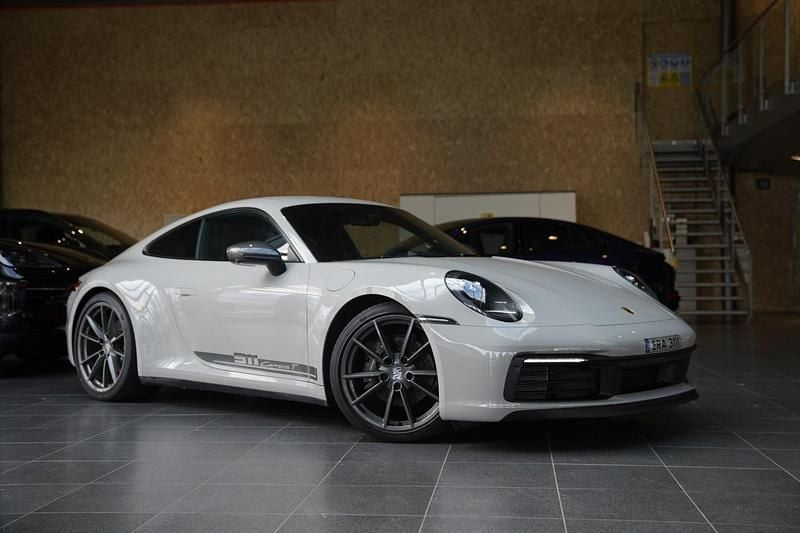 Grå Begagnad 2023 Porsche 911 Carrera T Sportkupé | 1 439 000 kr - Bild 1/4