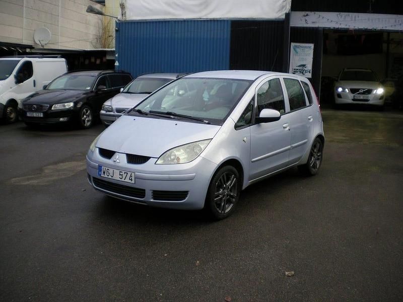 Blå Begagnad 2005 Mitsubishi Colt Halvkombi | 13 000 kr (Marknadspris) - Bild 1/4
