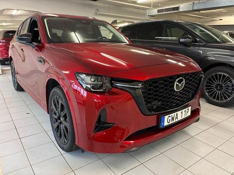 Röd (soul red crystal) Begagnad 2022 Mazda CX-60 Homura-Line SUV | 381 900 kr (Marknadspris) - Bild 1/4