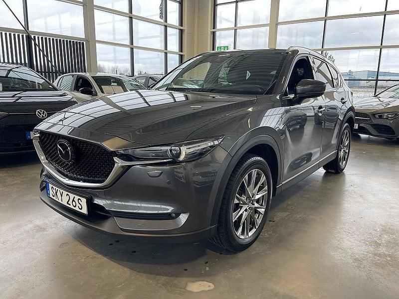 Grå Begagnad 2020 Mazda CX-5 Signature SUV | 309 900 kr (Marknadspris) - Bild 1/3