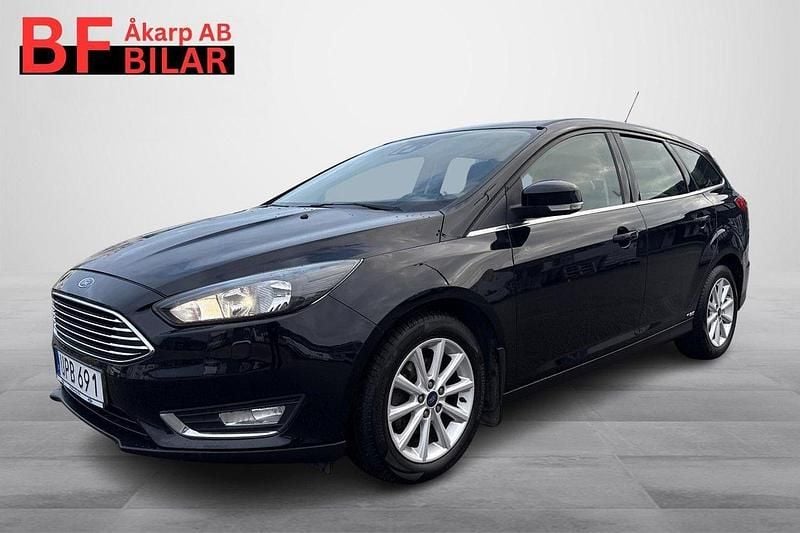 Svart Begagnad 2015 Ford Focus Titanium Kombi | 84 500 kr (Marknadspris) - Bild 1/4