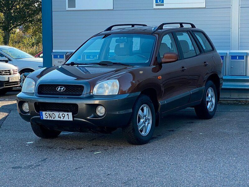 Brun Begagnad 2001 Hyundai Santa Fe SUV | 19 000 kr (Bra pris) - Bild 1/4