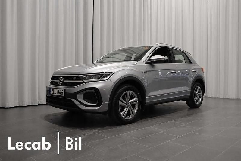 Pyrit silver metallic Begagnad 2024 VW T-Roc R-line SUV | 369 500 kr (Marknadspris) - Bild 1/4