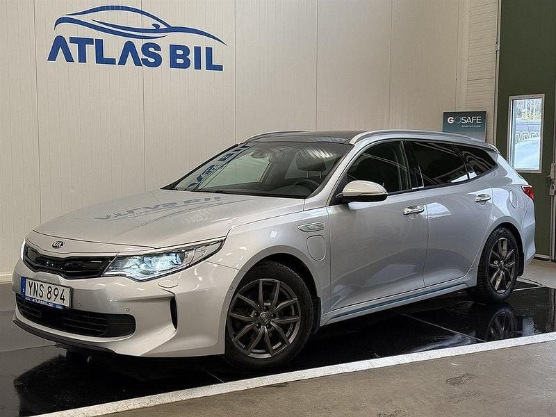 Grå Begagnad 2018 Kia Optima Hybrid Advance Sedan | 159 900 kr (Marknadspris) - Bild 1/4