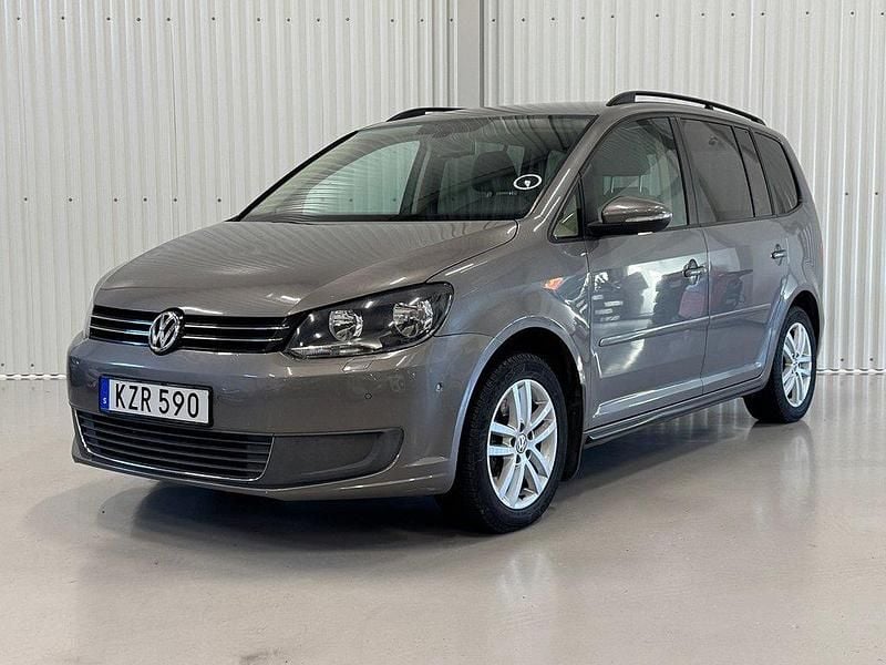 Grå Begagnad 2010 VW Touran Minibuss | 139 900 kr - Bild 1/4
