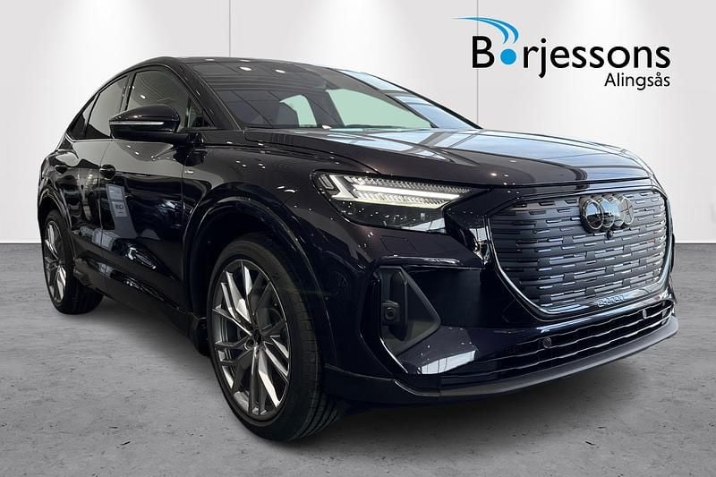 Lila Begagnad 2024 Audi Q4 Sportback e-tron S-Line SUV | 908 900 kr - Bild 1/4