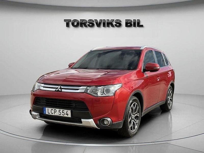 Mörkröd (rödmet) Begagnad 2014 Mitsubishi Outlander SUV | 149 900 kr (Marknadspris) - Bild 1/4