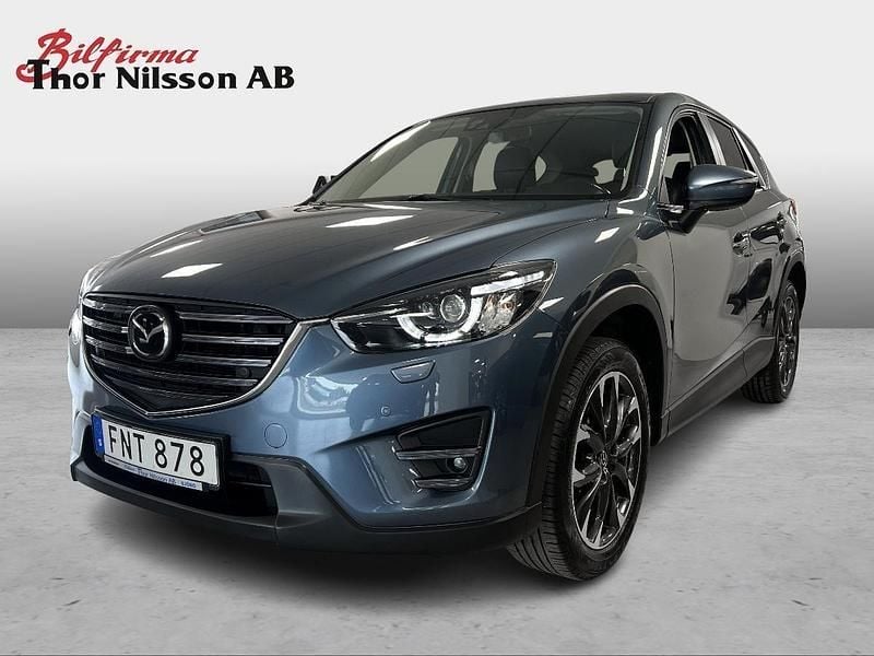 Blå Begagnad 2015 Mazda CX-5 Optimum SUV | 187 900 kr (Marknadspris) - Bild 1/4