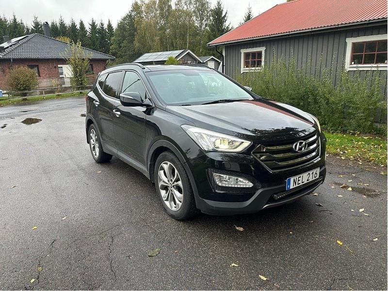 Svart Begagnad 2013 Hyundai Santa Fe Premium SUV | 140 000 kr (Marknadspris) - Bild 1/4