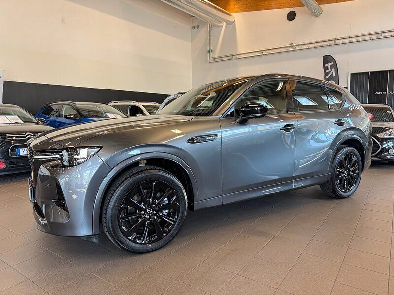 Grå Begagnad 2024 Mazda CX-60 Homura-Line SUV | 619 900 kr - Bild 1/4