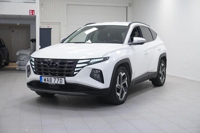 Vit Begagnad 2022 Hyundai Tucson Advanced SUV | 269 800 kr (Marknadspris) - Bild 1/4