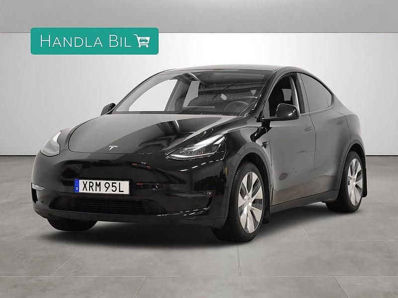 Svart Begagnad 2023 Tesla Model Y Long Range AWD SUV | 389 900 kr (Dyr) - Bild 1/4
