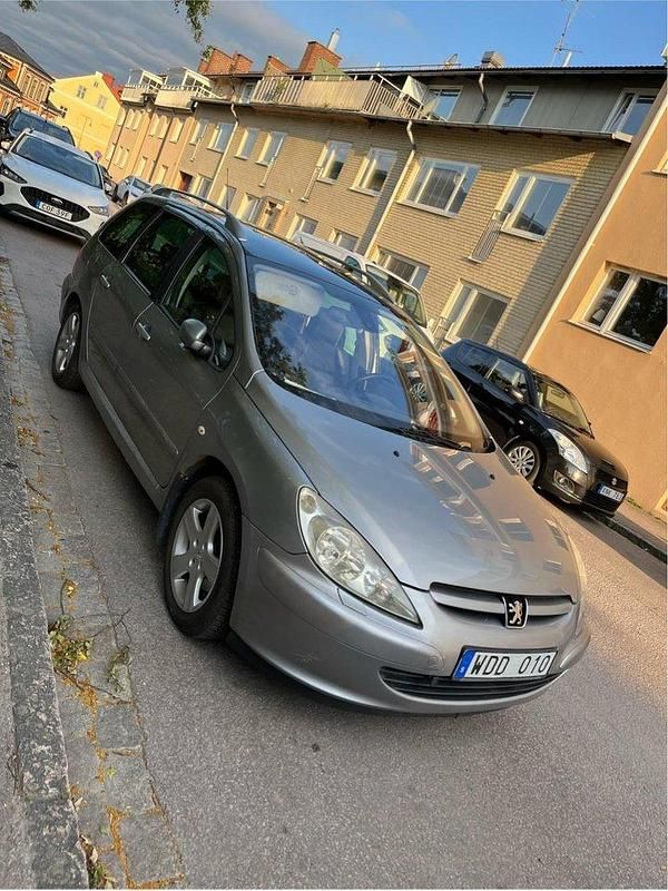Grå Begagnad 2005 Peugeot 307 Kombi | 22 000 kr (Bra pris) - Bild 1/4