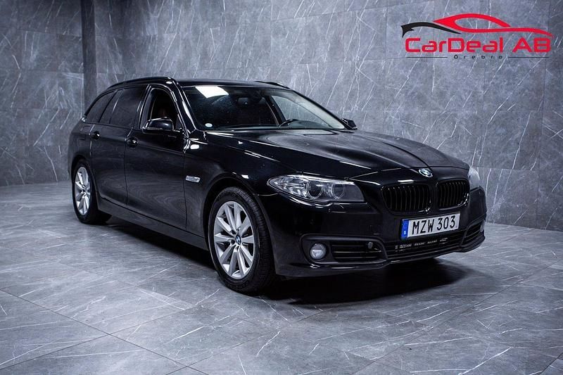 Svart Begagnad 2014 BMW 530 Kombi | 148 800 kr (Marknadspris) - Bild 1/4