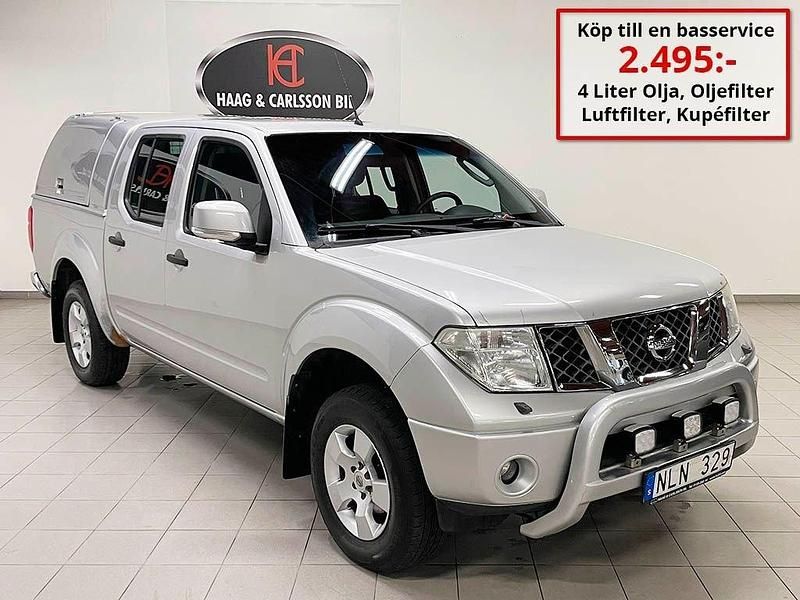 Silver Begagnad 2008 Nissan Navara Pickup | 89 000 kr (Marknadspris) - Bild 1/4