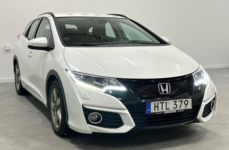 Begagnad Honda Civic 141 HK (103 kW) 2015 Vit Kombi