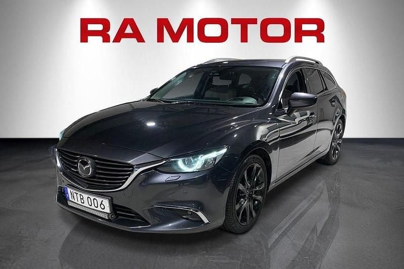 Grå Begagnad 2015 Mazda 6 Optimum Kombi | 169 900 kr (Marknadspris) - Bild 1/4
