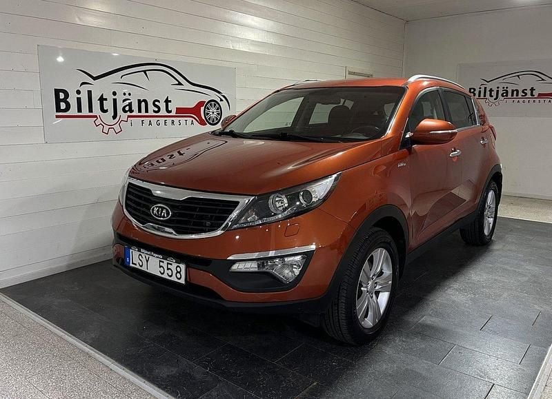 Orange Begagnad 2011 Kia Sportage SUV | 99 999 kr (Marknadspris) - Bild 1/4