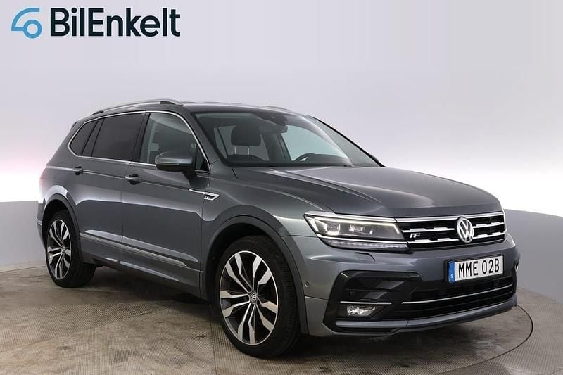Mörkgrå (grå) Begagnad 2019 VW Tiguan Allspace R-line SUV | 334 800 kr (Marknadspris) - Bild 1/4
