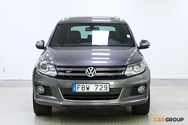 Mörkgrå (grå) Begagnad 2013 VW Tiguan Sportline SUV | 152 900 kr (Lite dyr) - Bild 1/4