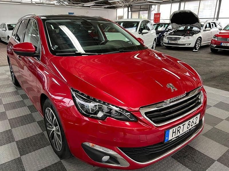 Mörkröd Begagnad 2015 Peugeot 308 Allure Kombi | 109 000 kr (Dyr) - Bild 1/4